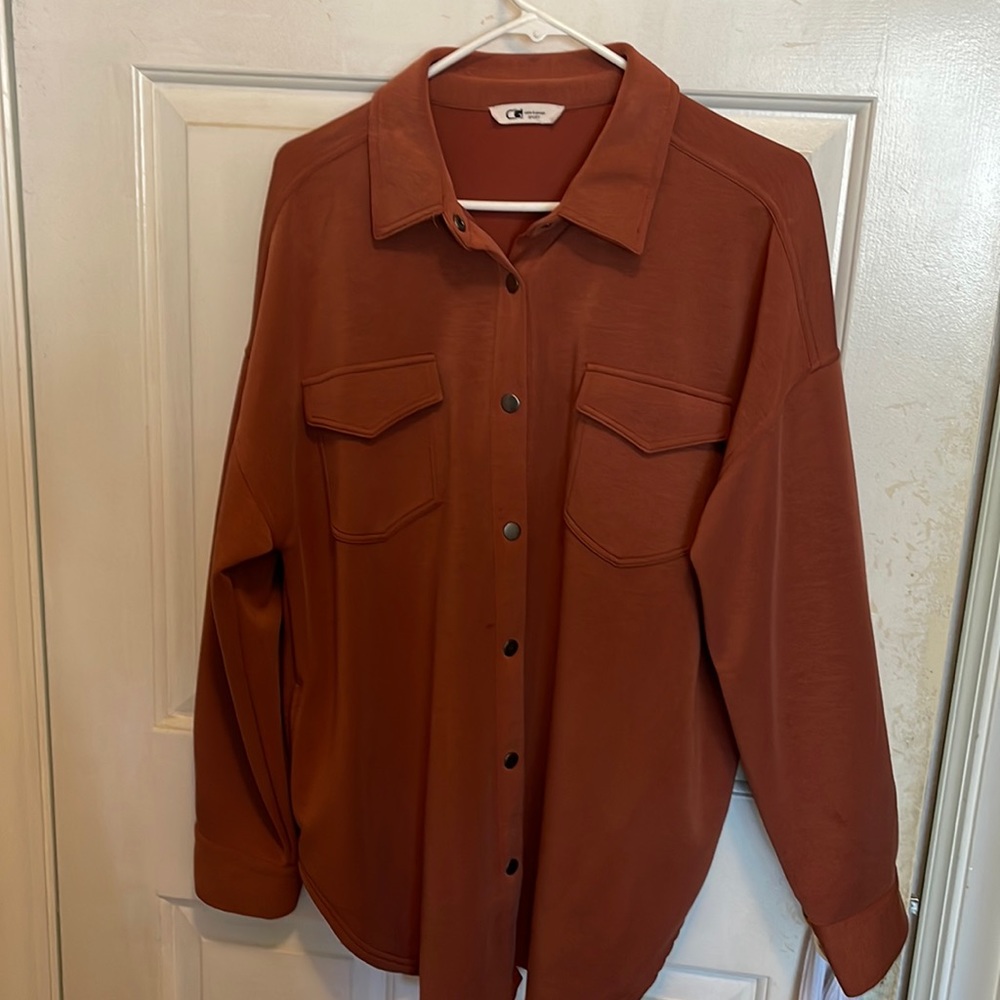 Long button down shirt/jacket.